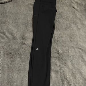 Lululemon speed up tight black, like new. Size 6 28”